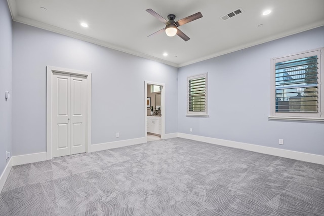 7160 W Dovewood Ln, Fresno, CA 93723 - unfurnished bedroom featuring ornamental molding, carpet floors, recessed lighting, ensuite bath, and a closet