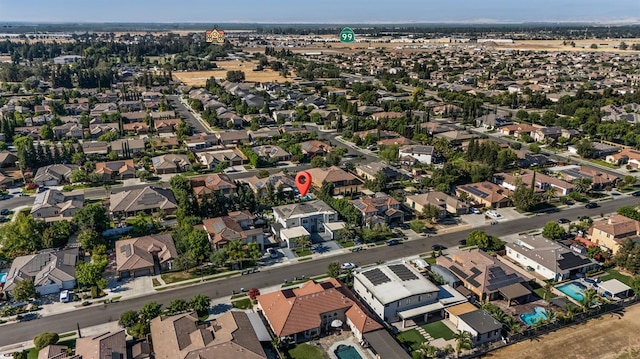 7160 W Dovewood Ln, Fresno, CA 93723 - aerial view of property's location with nearby suburban area
