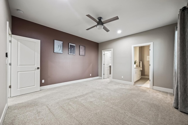 7160 W Dovewood Ln, Fresno, CA 93723 - unfurnished bedroom with light carpet, connected bathroom, and ceiling fan