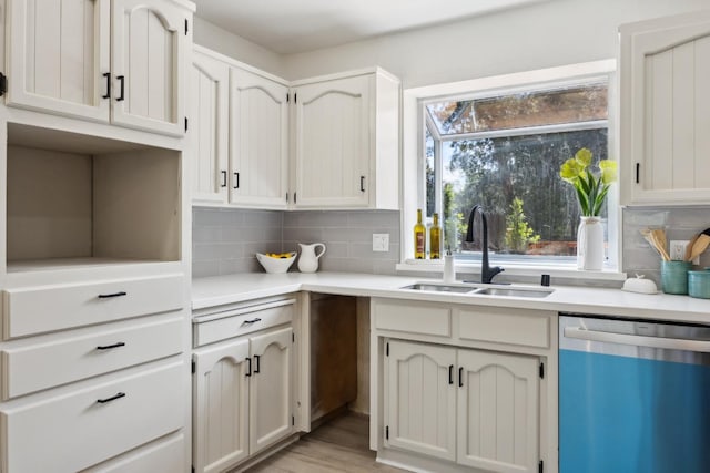 9098 San Gabriel Rd, Atascadero, CA 93422 - kitchen with dishwashing machine, tasteful backsplash, healthy amount of natural light, and light countertops