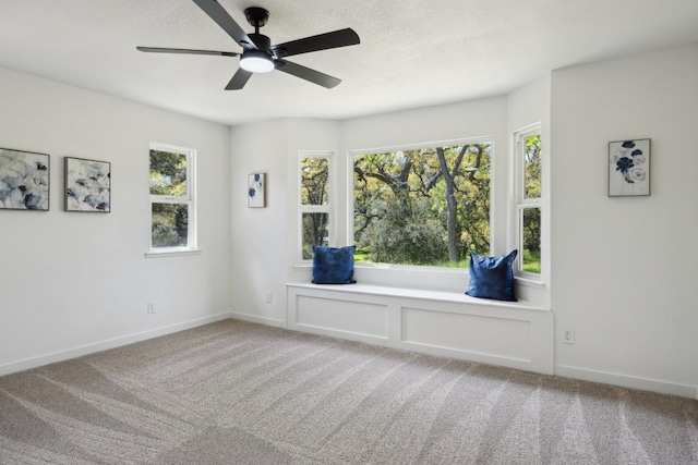 9098 San Gabriel Rd, Atascadero, CA 93422 - unfurnished room with light colored carpet, plenty of natural light, ceiling fan, and a textured ceiling