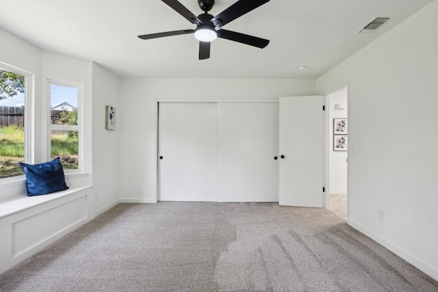 9098 San Gabriel Rd, Atascadero, CA 93422 - unfurnished bedroom featuring carpet, a closet, and a ceiling fan
