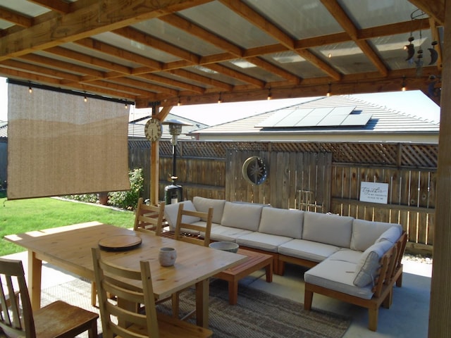 6908 E Castle Ave, Fresno, CA 93727 - fenced backyard with an outdoor hangout area and a patio