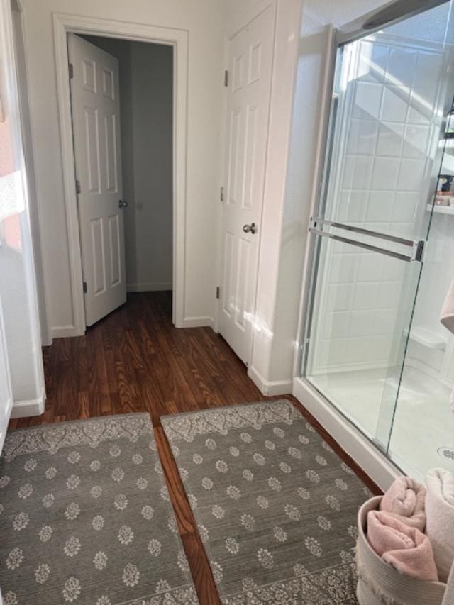6908 E Castle Ave, Fresno, CA 93727 - bathroom with wood finished floors and a stall shower