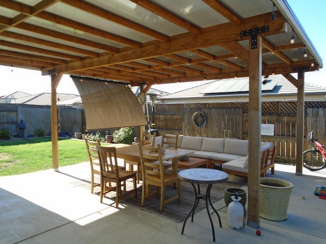 6908 E Castle Ave, Fresno, CA 93727 - fenced backyard featuring a patio area and outdoor dining area
