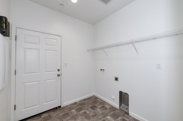 7173 N Shiraz, Fresno, CA 93722 - laundry area featuring electric dryer hookup, hookup for a washing machine, and stone finish flooring