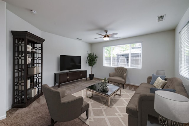 7173 N Shiraz, Fresno, CA 93722 - carpeted living room featuring healthy amount of natural light and a ceiling fan