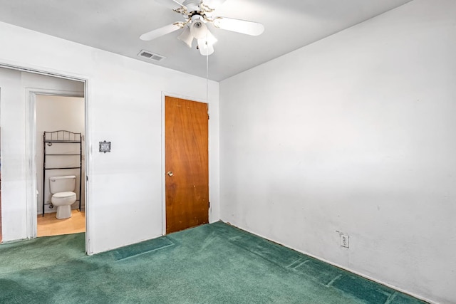 8573 E Ostler St, Selma, CA 93662 - unfurnished bedroom with carpet floors and ceiling fan