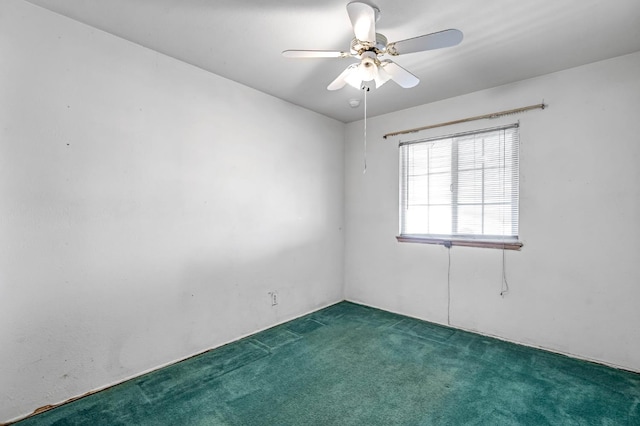 8573 E Ostler St, Selma, CA 93662 - spare room featuring carpet and a ceiling fan