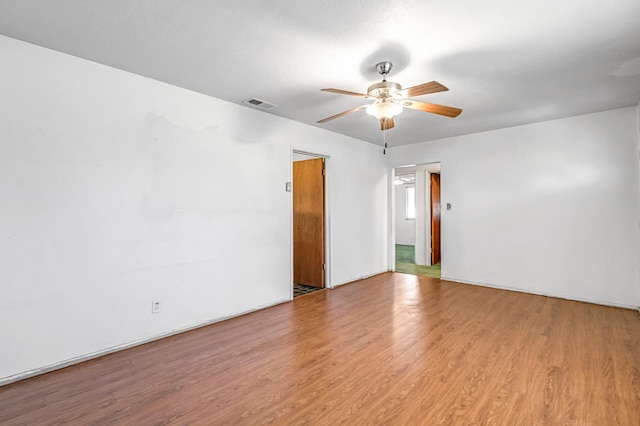 8573 E Ostler St, Selma, CA 93662 - spare room featuring a ceiling fan and wood finished floors