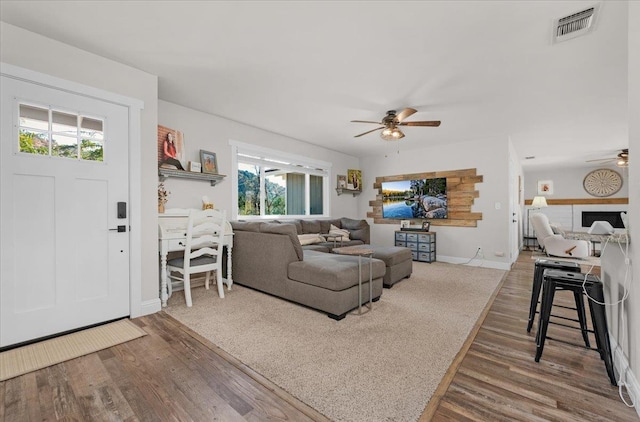 27762 Twin Ponds Rd, Clovis, CA 93619 - living area with a ceiling fan, healthy amount of natural light, and wood finished floors