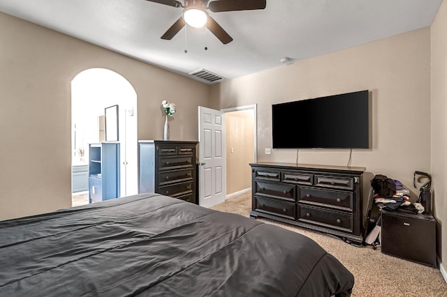 3615 W Michigan Ave, Fresno, CA 93722 - bedroom with carpet, a ceiling fan, and arched walkways