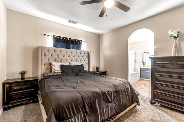 3615 W Michigan Ave, Fresno, CA 93722 - carpeted bedroom featuring connected bathroom and a ceiling fan