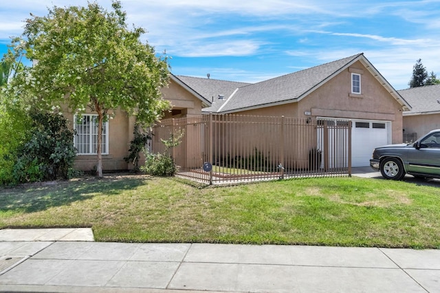 3615 W Michigan Ave, Fresno, CA 93722 - view of front of house featuring an attached garage and stucco siding