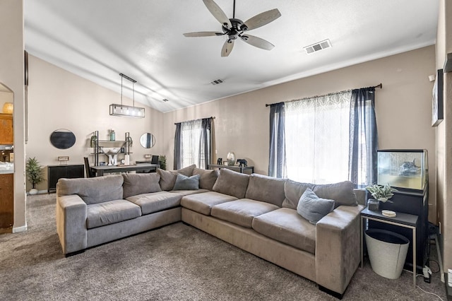 3615 W Michigan Ave, Fresno, CA 93722 - carpeted living room with vaulted ceiling and ceiling fan