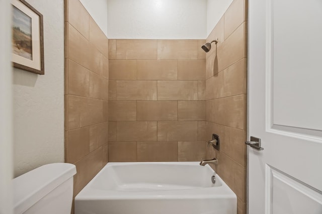 998 Highland Rd W, Madera, CA 93636 - bathroom featuring shower / washtub combination and a textured wall