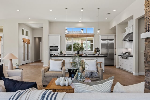 998 Highland Rd W, Madera, CA 93636 - living room with recessed lighting and light tile patterned floors