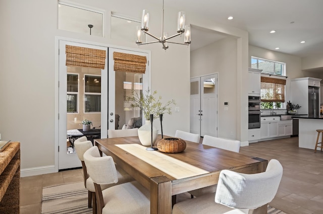 998 Highland Rd W, Madera, CA 93636 - dining space featuring a chandelier, recessed lighting, and a towering ceiling