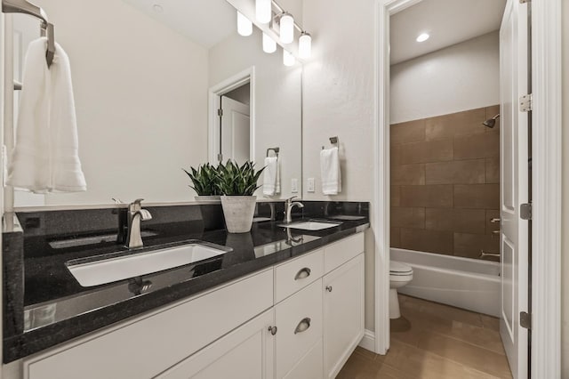 998 Highland Rd W, Madera, CA 93636 - full bath featuring double vanity, tile patterned floors, and bathing tub / shower combination