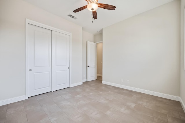 998 Highland Rd W, Madera, CA 93636 - unfurnished bedroom featuring a closet and a ceiling fan