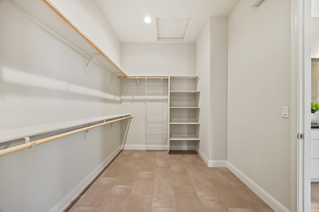 998 Highland Rd W, Madera, CA 93636 - walk in closet featuring attic access
