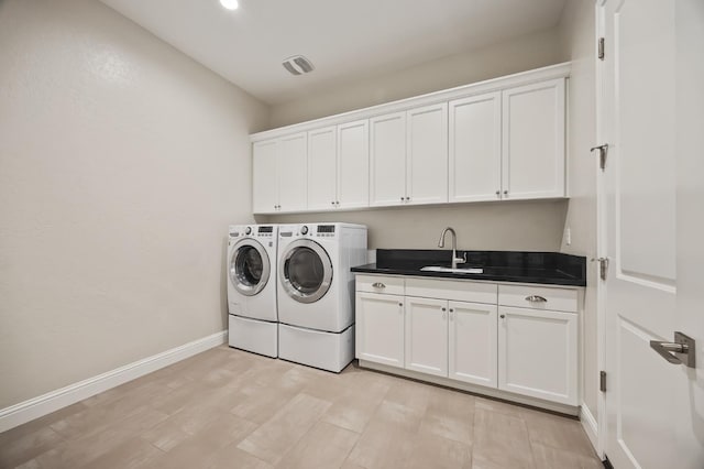 998 Highland Rd W, Madera, CA 93636 - laundry area featuring washing machine and dryer, cabinet space, and recessed lighting