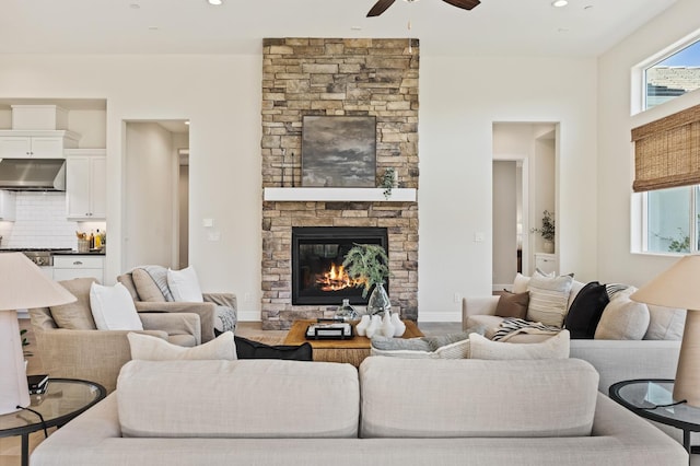998 Highland Rd W, Madera, CA 93636 - living room with a ceiling fan, a fireplace, recessed lighting, and wood finished floors