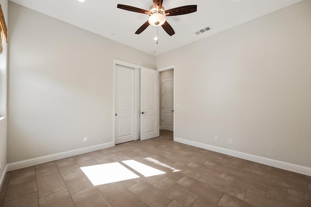 998 Highland Rd W, Madera, CA 93636 - unfurnished bedroom featuring ceiling fan and a closet