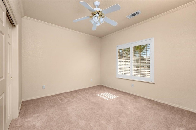 431 S Fowler Ave, Fresno, CA 93727 - unfurnished room with carpet, a ceiling fan, and crown molding