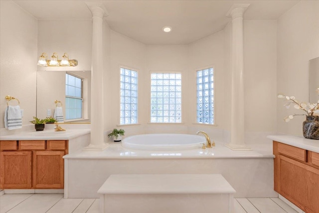 431 S Fowler Ave, Fresno, CA 93727 - bathroom with decorative columns, plenty of natural light, and vanity