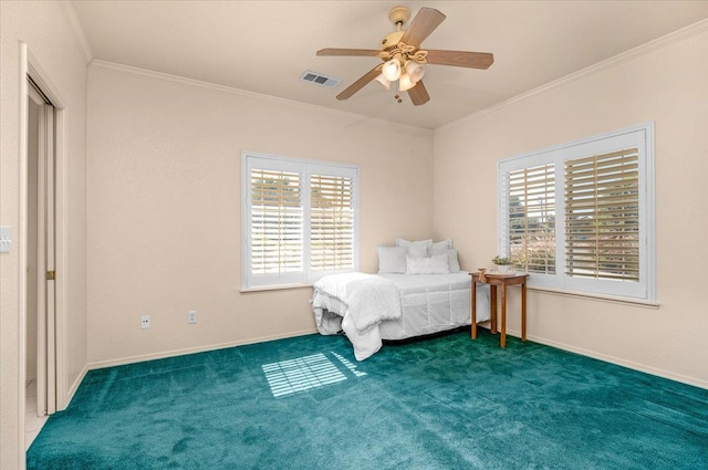 431 S Fowler Ave, Fresno, CA 93727 - bedroom with multiple windows, crown molding, dark colored carpet, and a ceiling fan