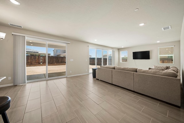 503 Cathedral Ct S, Madera, CA 93636 - living room featuring recessed lighting and wood tiled floors
