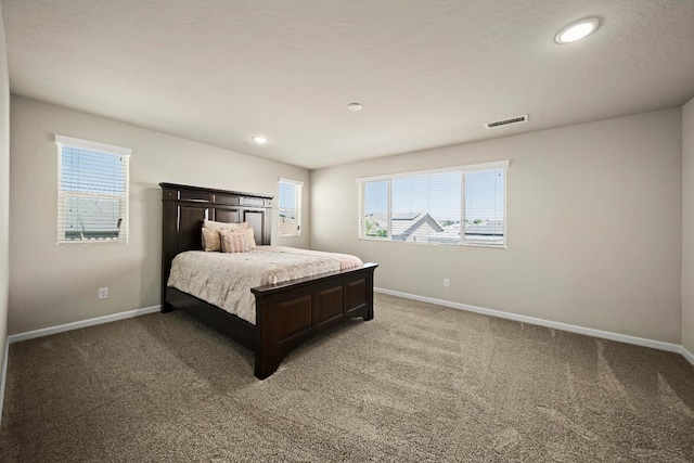 503 Cathedral Ct S, Madera, CA 93636 - bedroom with multiple windows, light colored carpet, and recessed lighting