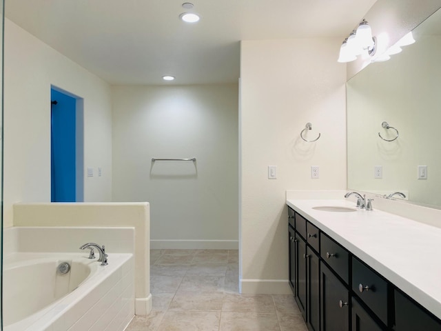 578 S Alpine Way S, Madera, CA 93636 - full bath with vanity, a bath, and recessed lighting