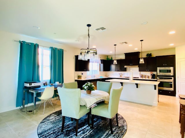 578 S Alpine Way S, Madera, CA 93636 - dining area with light tile patterned floors and recessed lighting
