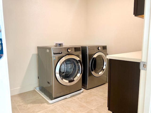 578 S Alpine Way S, Madera, CA 93636 - laundry area with separate washer and dryer and light tile patterned flooring