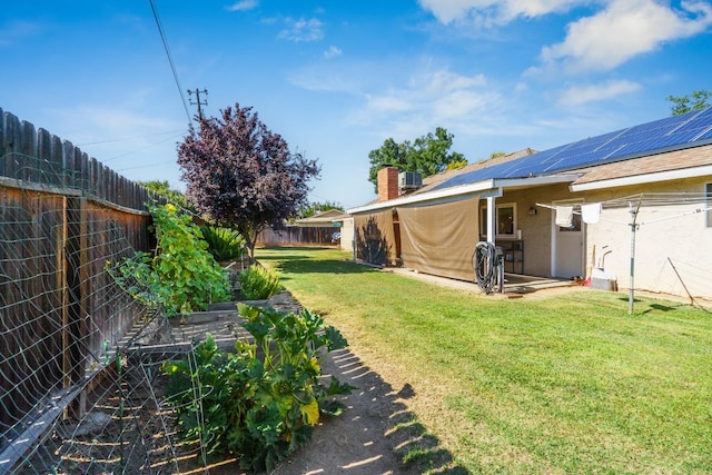11736 Waverly Rd, Madera, CA 93636 - fenced backyard with a vegetable garden and a patio