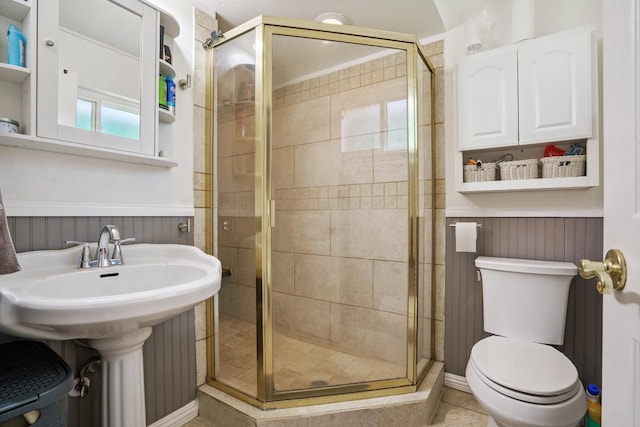 11736 Waverly Rd, Madera, CA 93636 - full bath featuring a shower stall and a wainscoted wall