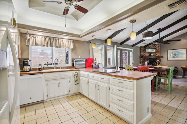 11736 Waverly Rd, Madera, CA 93636 - kitchen with dishwasher, a ceiling fan, light tile patterned floors, and a peninsula