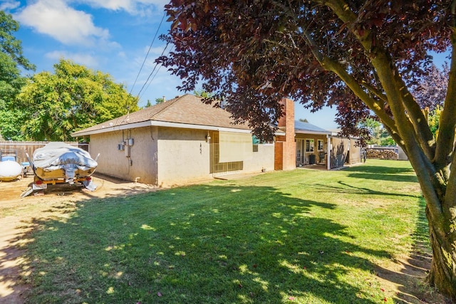11736 Waverly Rd, Madera, CA 93636 - rear view of property with stucco siding and a chimney