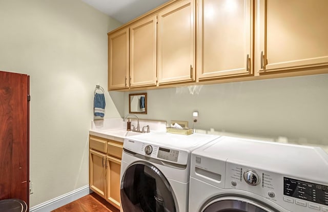 4632 W Minarets Ave, Fresno, CA 93722 - laundry area with washing machine and dryer, cabinet space, and dark wood finished floors
