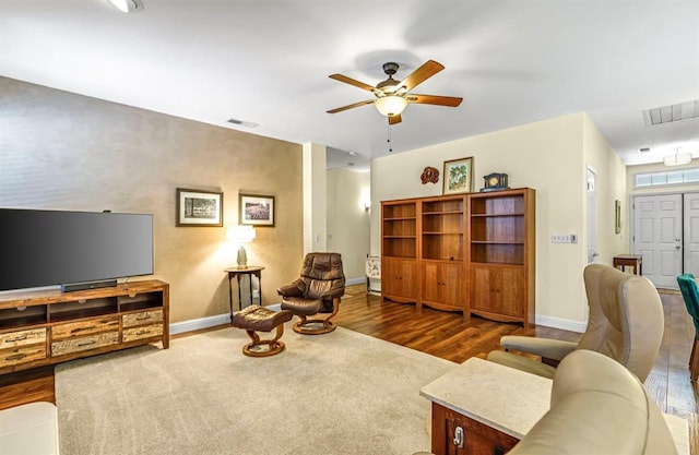 4632 W Minarets Ave, Fresno, CA 93722 - living room featuring ceiling fan, wood finished floors, and attic access
