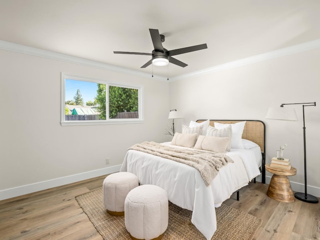 3844 E Holland Ave, Fresno, CA 93726 - bedroom featuring crown molding, wood finished floors, and ceiling fan