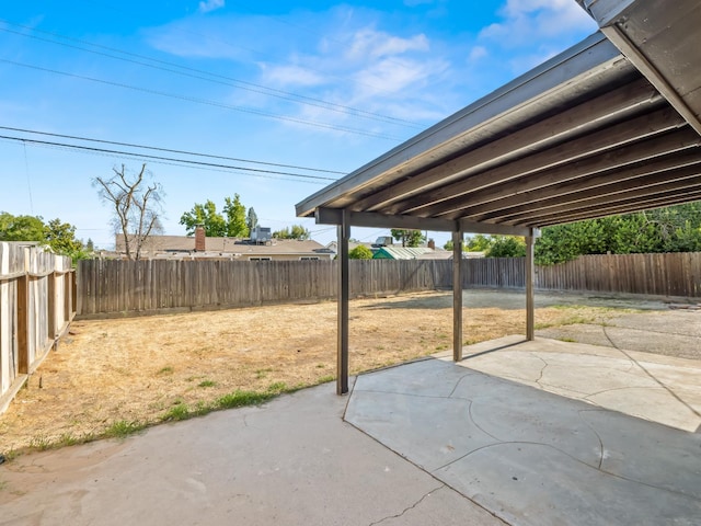 3844 E Holland Ave, Fresno, CA 93726 - fenced backyard featuring a patio area