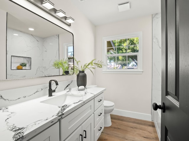3844 E Holland Ave, Fresno, CA 93726 - full bathroom featuring vanity and wood finished floors