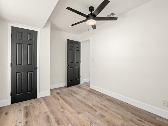 3844 E Holland Ave, Fresno, CA 93726 - unfurnished bedroom featuring light wood-type flooring and a ceiling fan