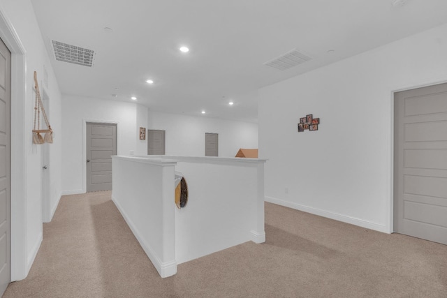 6569 E Lyell Ave, Fresno, CA 93727 - kitchen with recessed lighting and light carpet