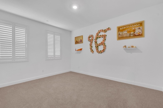 6569 E Lyell Ave, Fresno, CA 93727 - spare room featuring carpet floors and recessed lighting