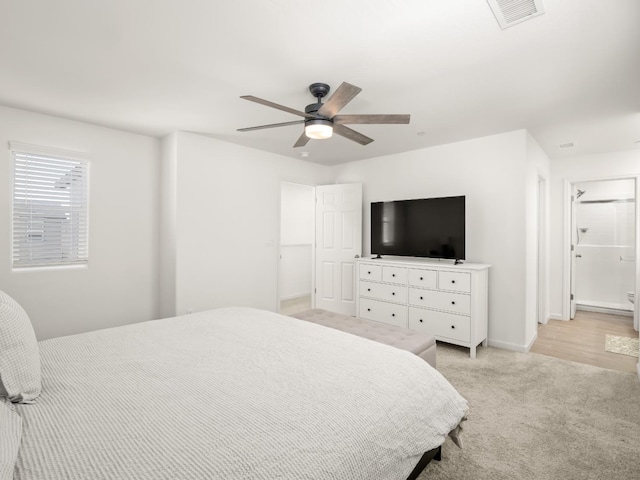 6274 E Riesling Dr, Fresno, CA 93727 - bedroom featuring light carpet and ceiling fan