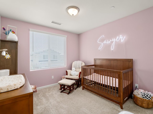 6274 E Riesling Dr, Fresno, CA 93727 - carpeted bedroom with a nursery area and baseboards